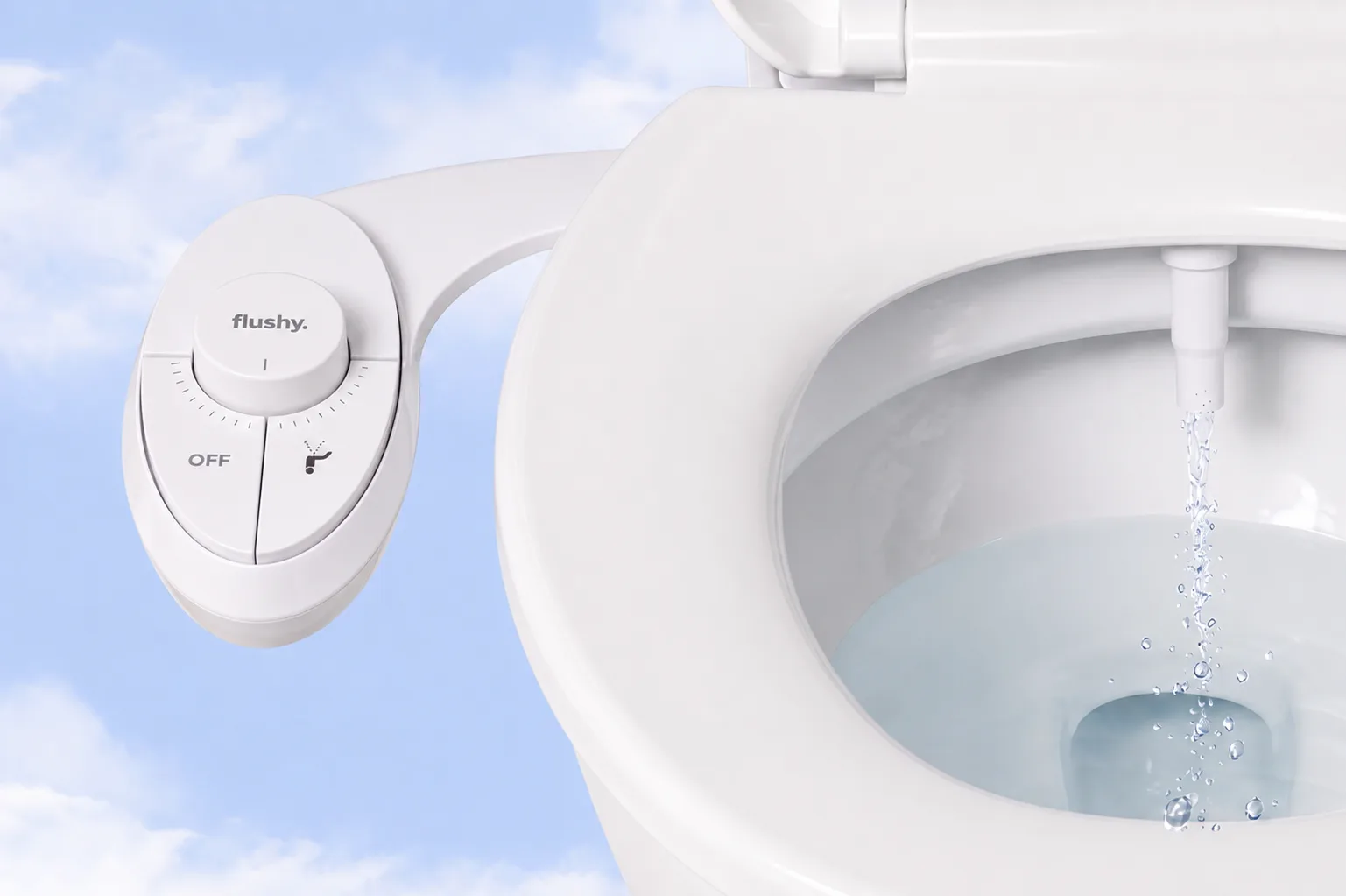 Hand turning the Flushy pressure dial while water sprays into the toilet